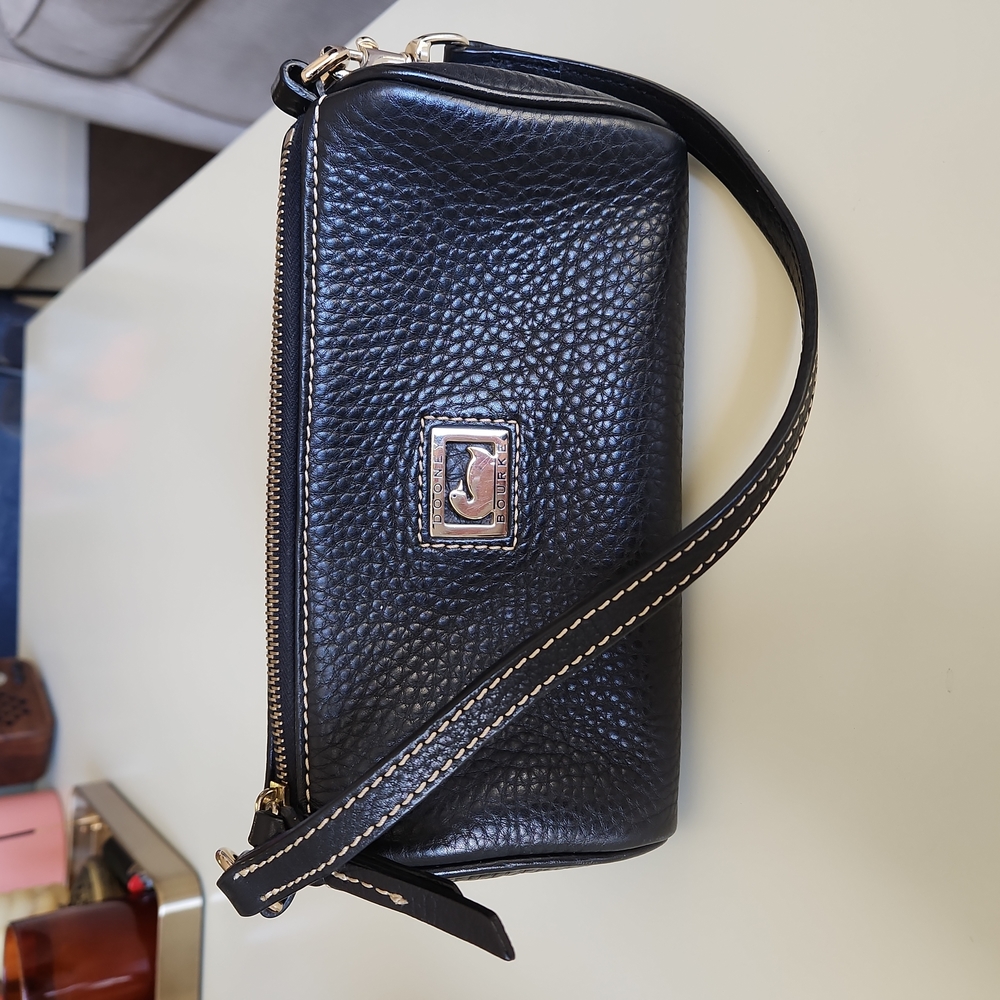 Dooney Bourke black leather mini barrel bag
